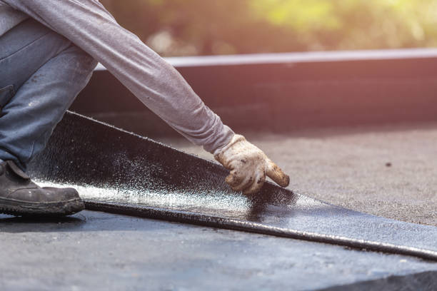 Professional Basement Waterproofing technician working in Winn, MI